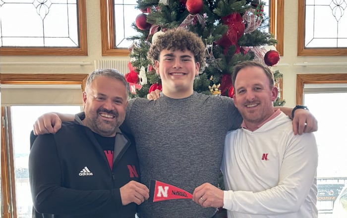 Landen Davidson with Nebraska football head coach Matt Rhule and offensive coordinator Marcus Satterfield